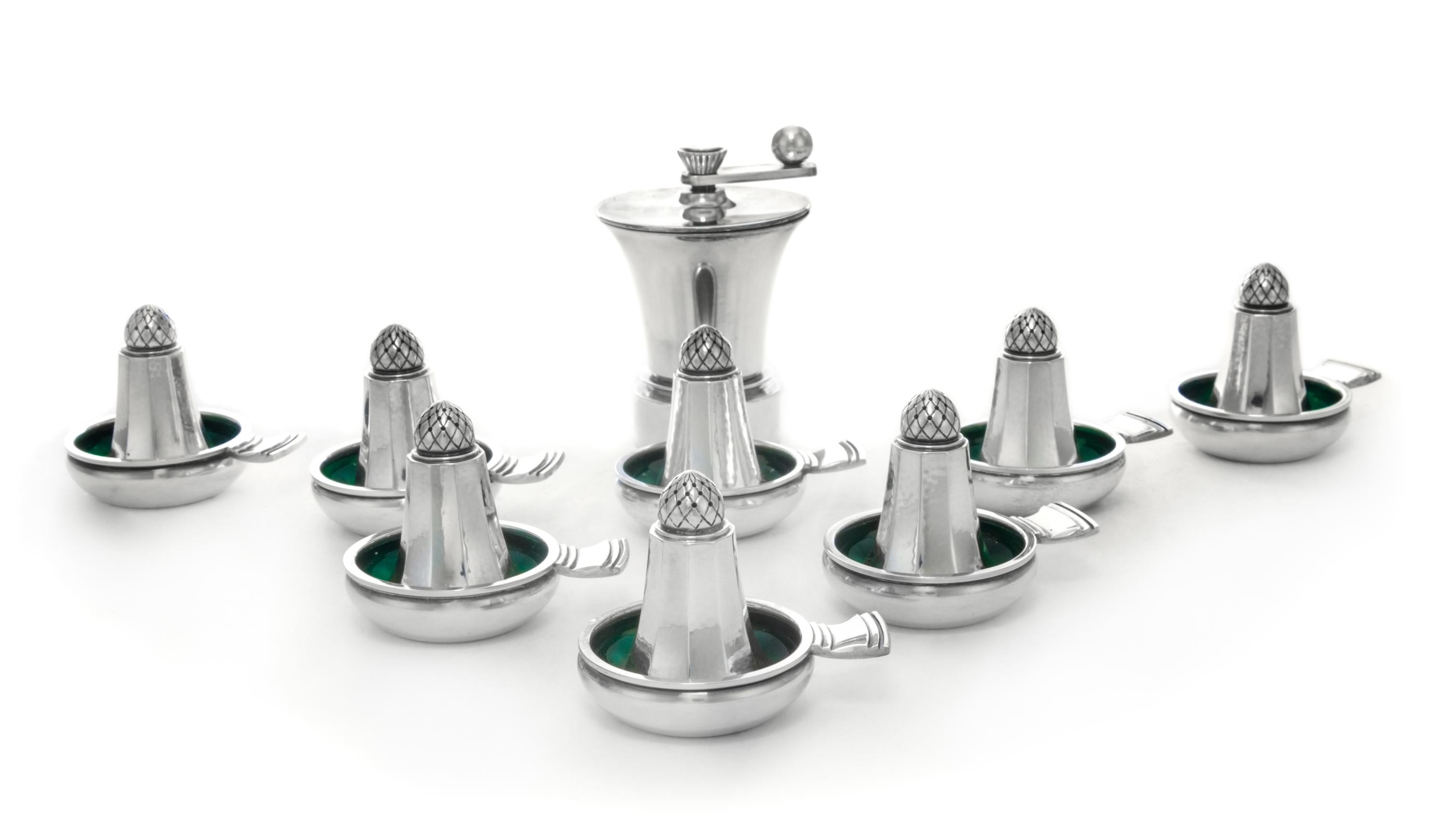 A Group of Danish Silver Table Articles, Georg Jensen Silversmithy, Copenhagen, 1945-77, comprising eight casters in the Acorn pattern,