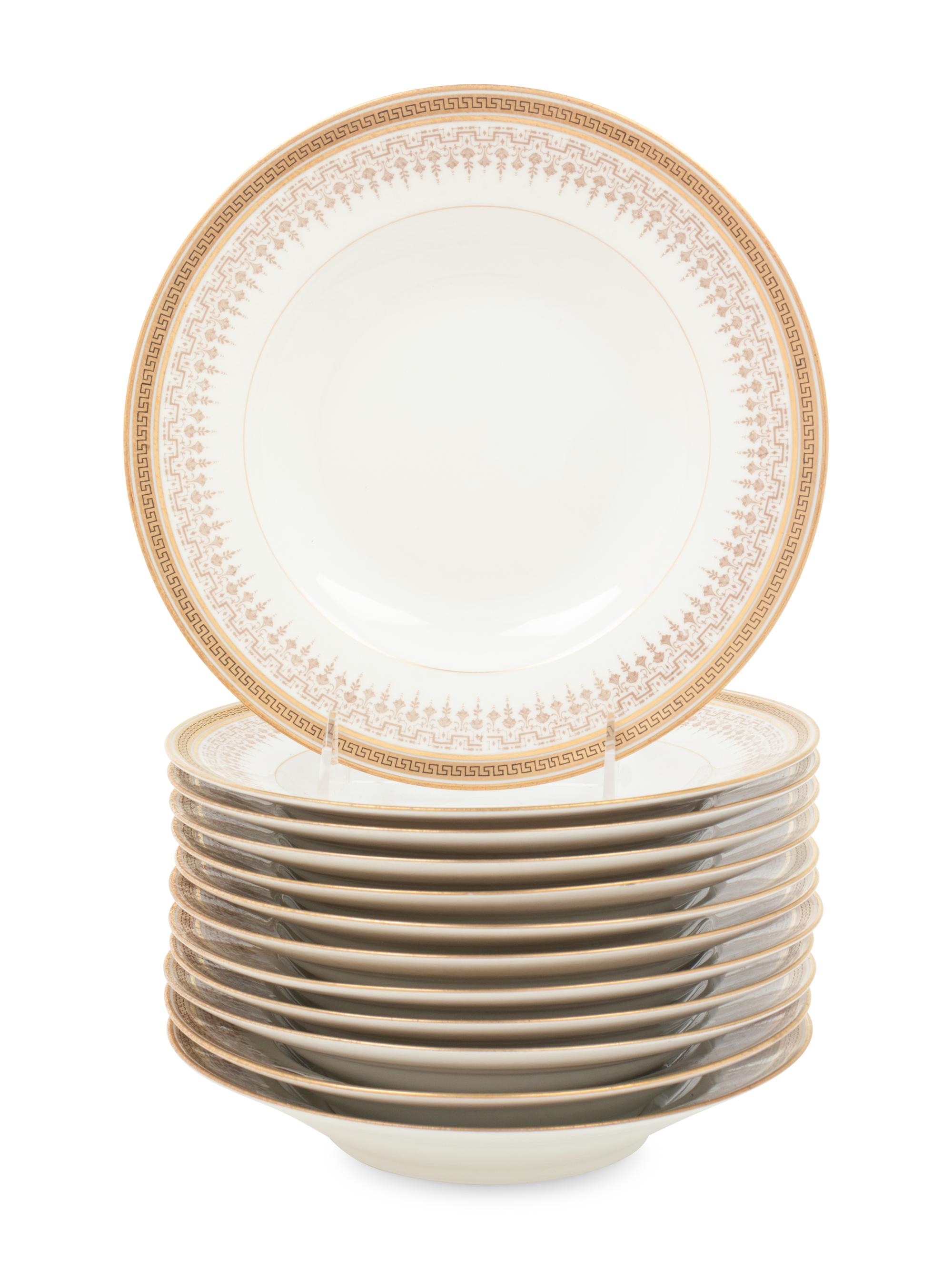 A Set of Twelve French Porcelain Soup Plates