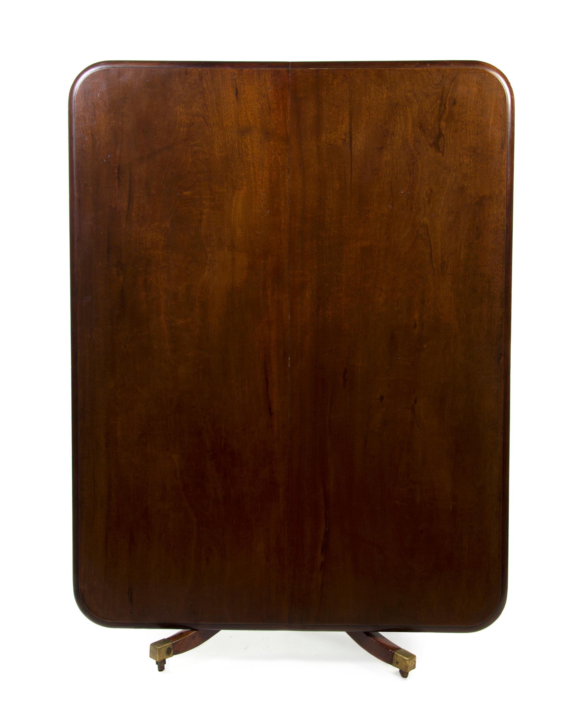 A George III Mahogany Tilt-Top Breakfast Table, Height 28 x width 45 x depth 58 1/2 inches.