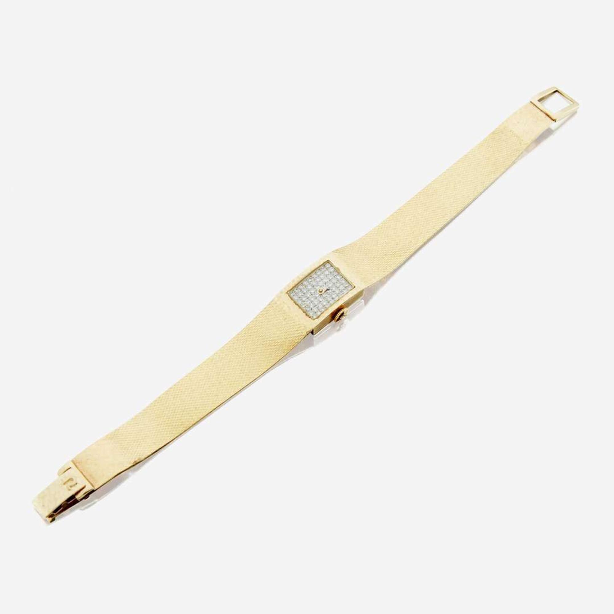 A lady's gold and diamond bracelet wristwatch, Omega