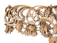 A French Carved Limewood Overdoor Panel Carved with Fruit, Flowers and Seashells