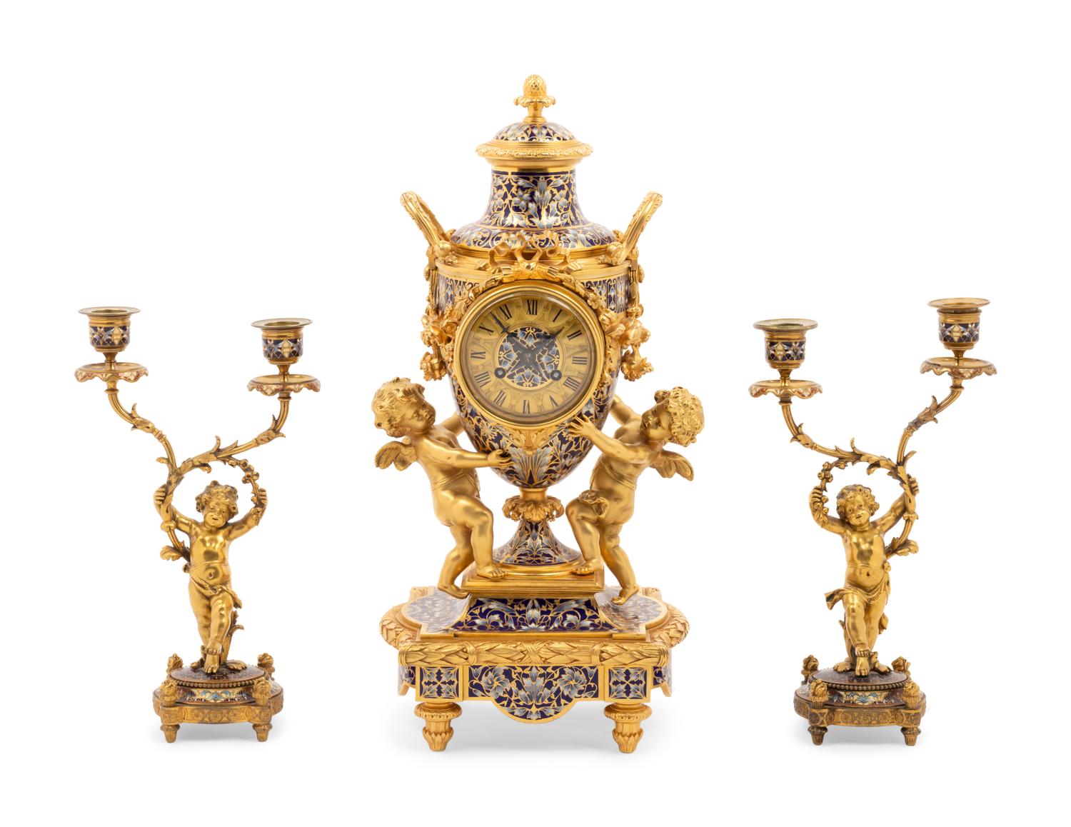 A French Gilt Bronze and Champlevé Clock Garniture Retailed by Tiffany & Co.