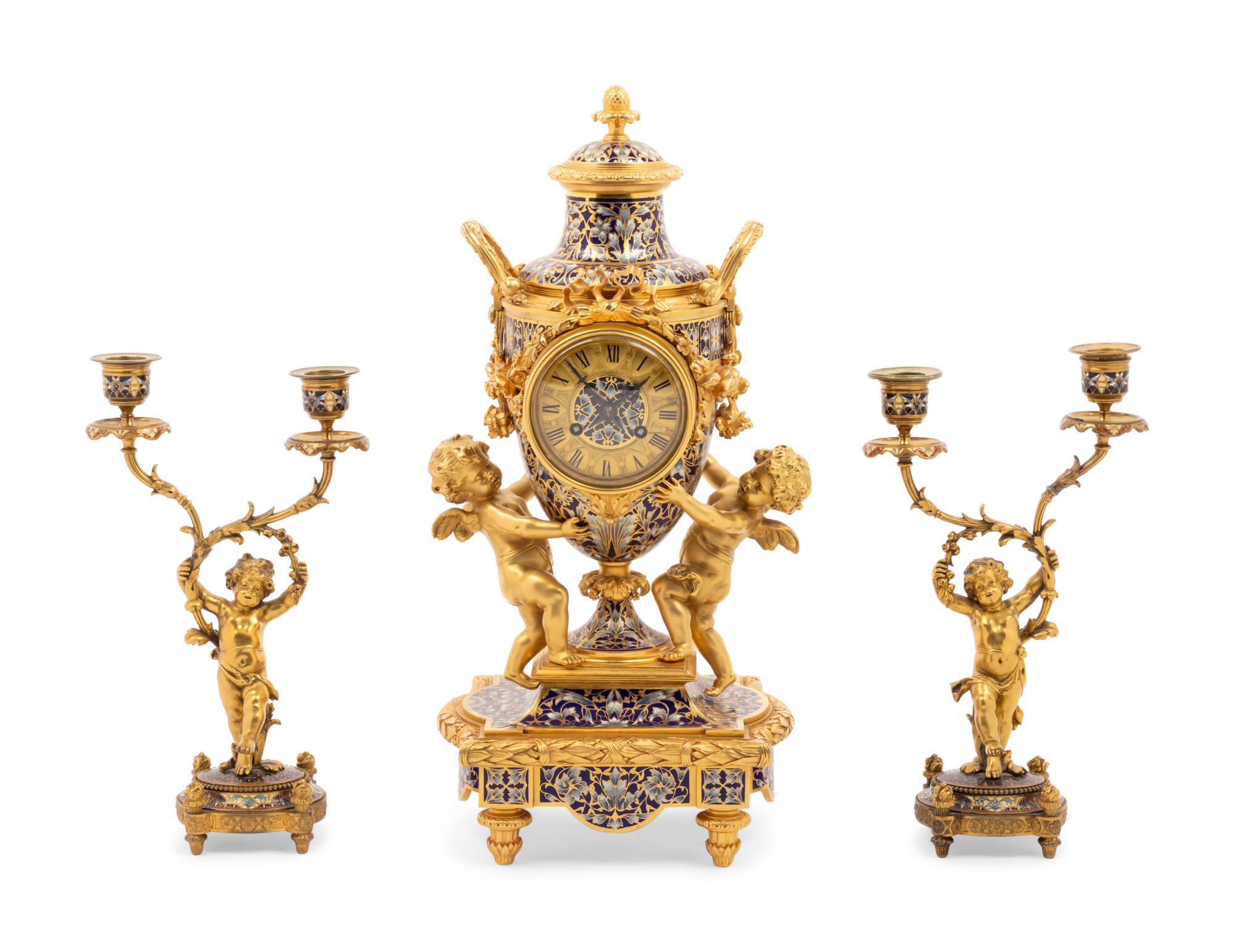 A French Gilt Bronze and Champlevé Clock Garniture Retailed by Tiffany & Co.