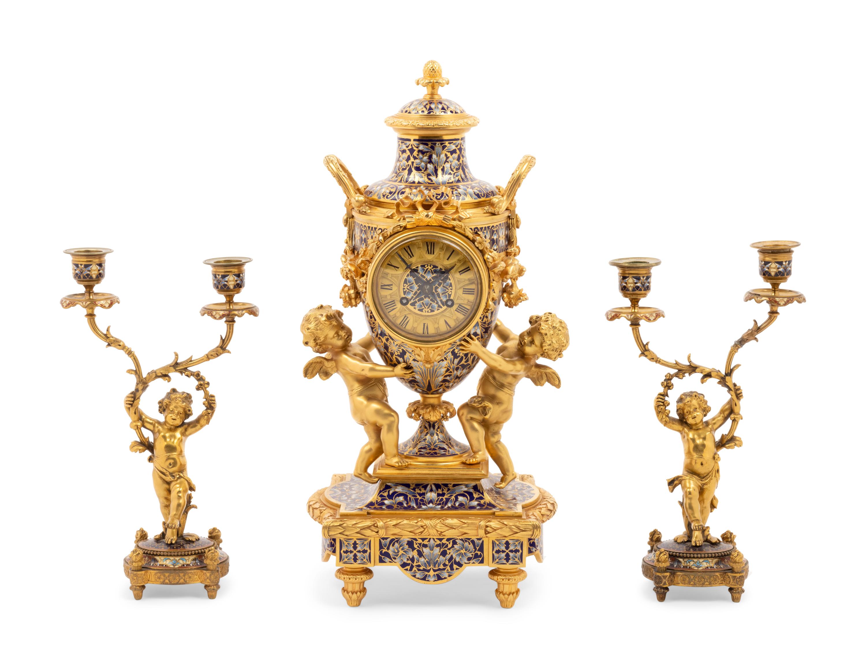 A French Gilt Bronze and Champlevé Clock Garniture Retailed by Tiffany & Co.