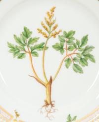 Fourteen Royal Copenhagen Flora Danica Porcelain Bread Plates