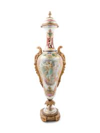 A Large Sèvres Style Gilt Bronze Mounted Painted and Parcel Gilt Porcelain Covered Urn