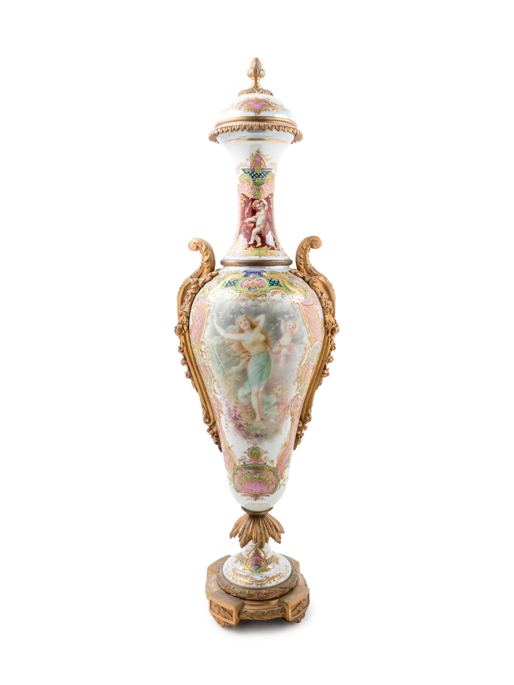 A Large Sèvres Style Gilt Bronze Mounted Painted and Parcel Gilt Porcelain Covered Urn