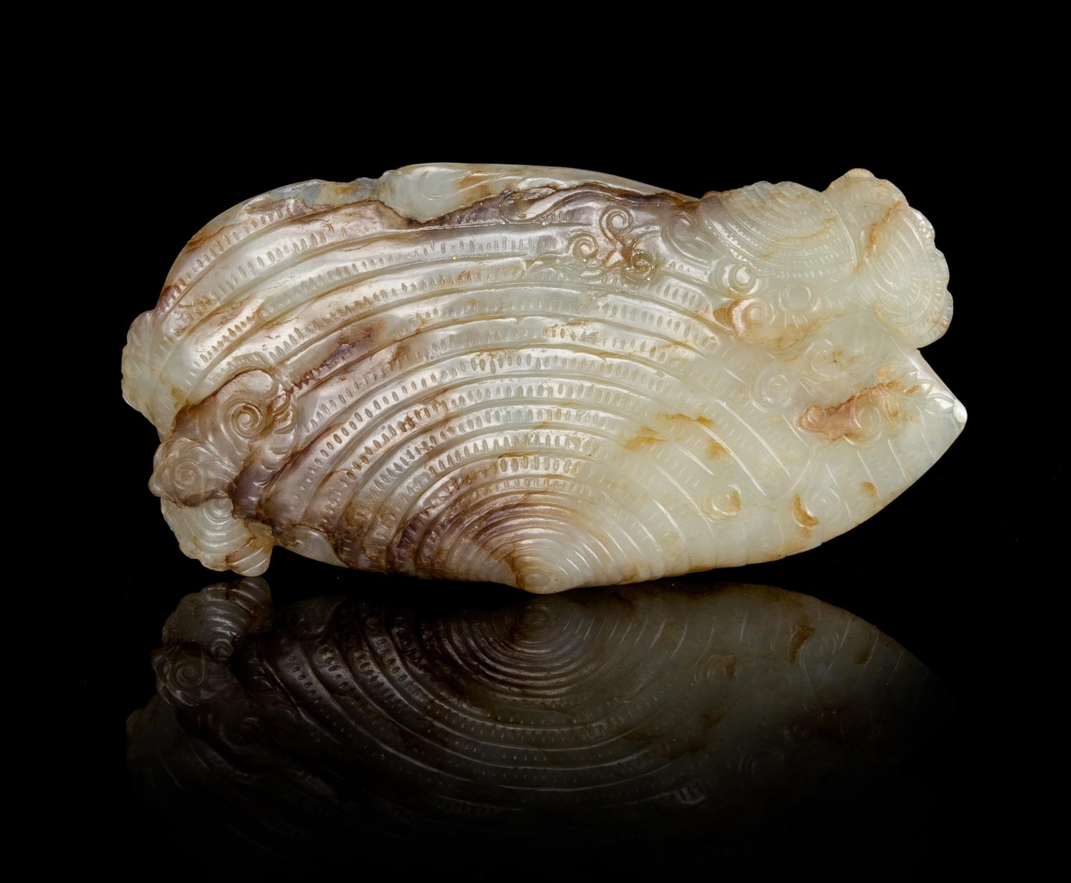 A Near-White and Russet Jade 'Shell' Ink Palette — LIKELY MING DYNASTY