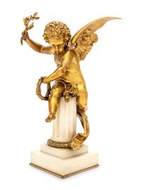 A Gilt Bronze and Marble Putto Ornament