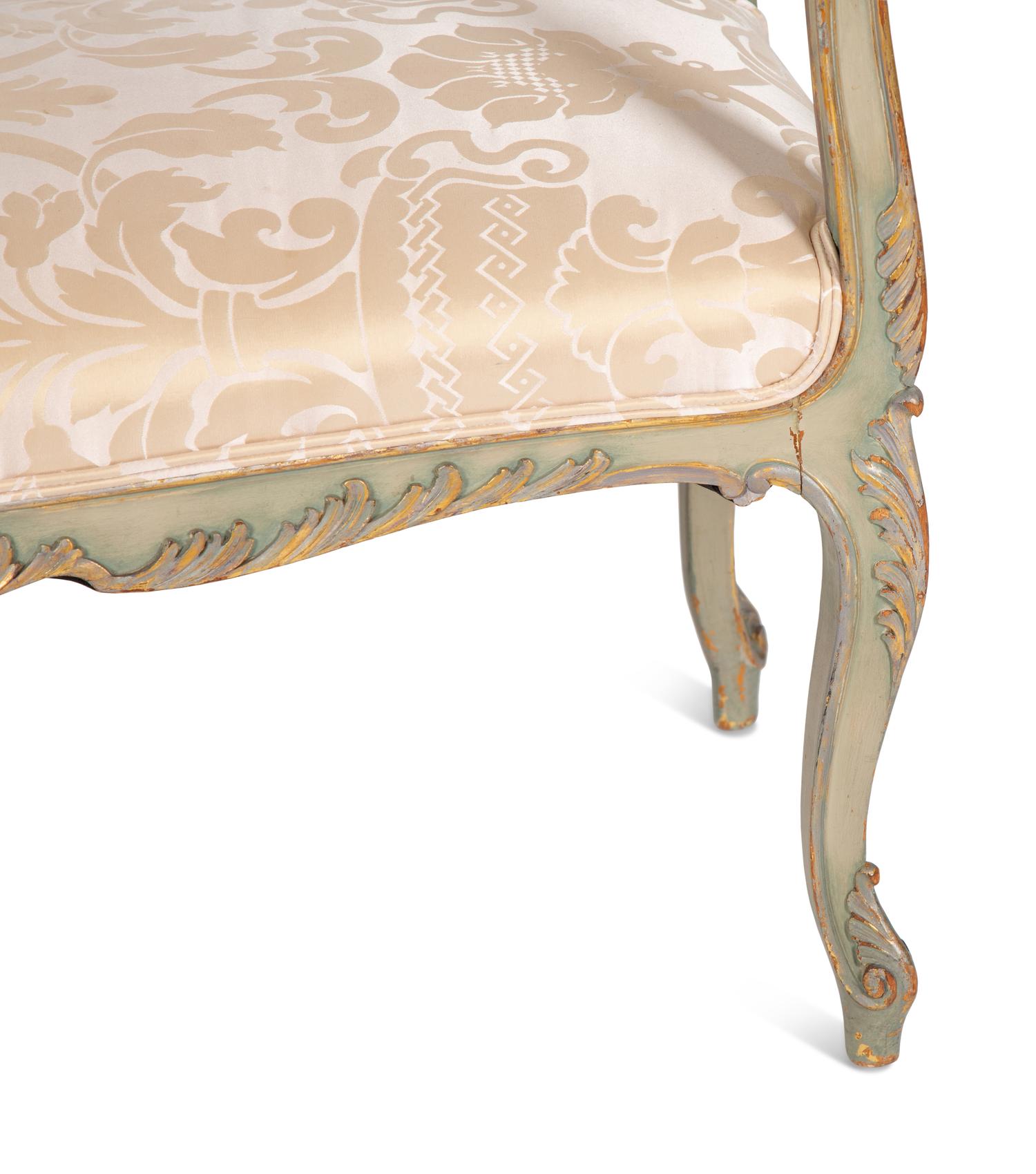 A Continental Painted and Parcel Gilt Bench