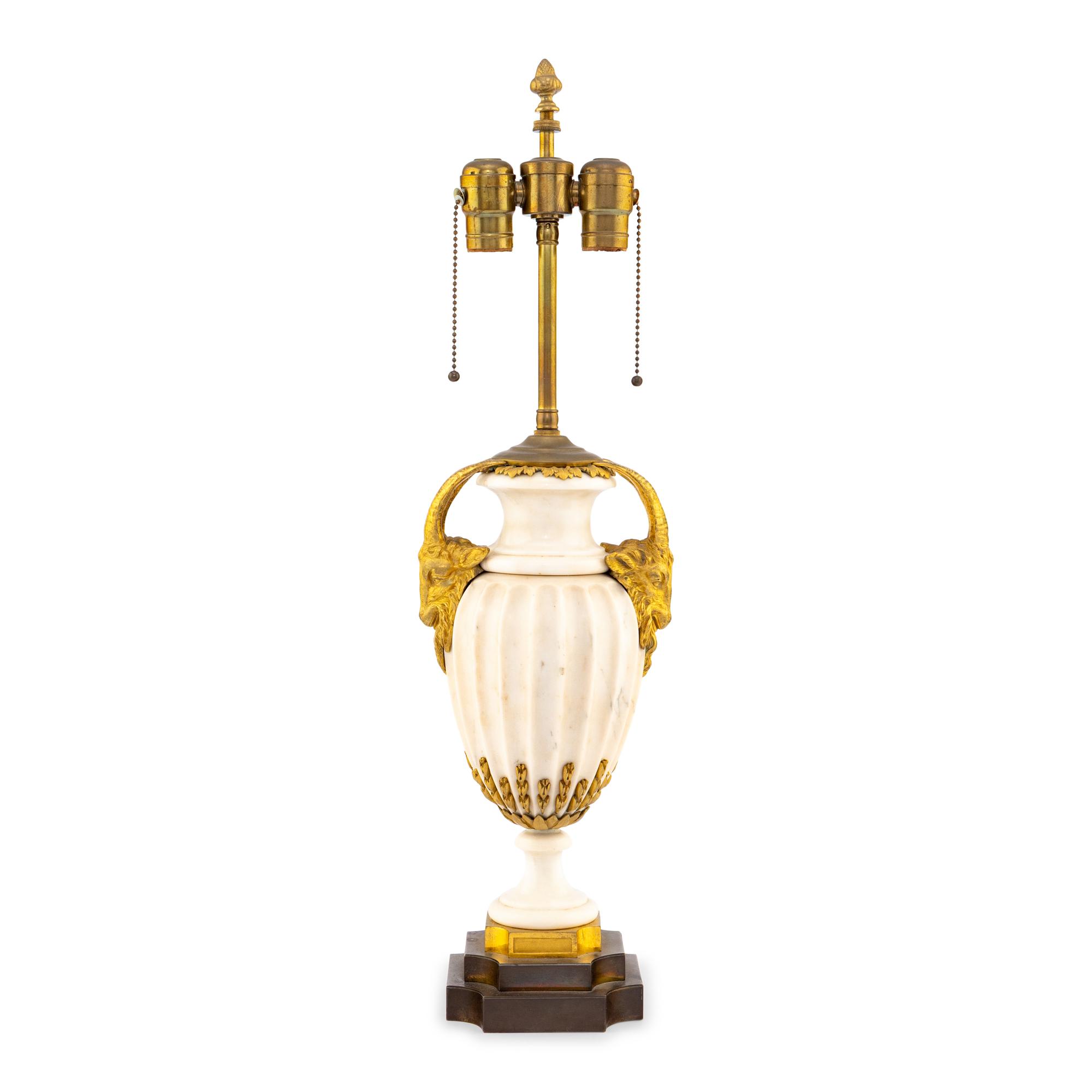 A French Neoclassical Style Gilt Bronze Mounted Marble Urn