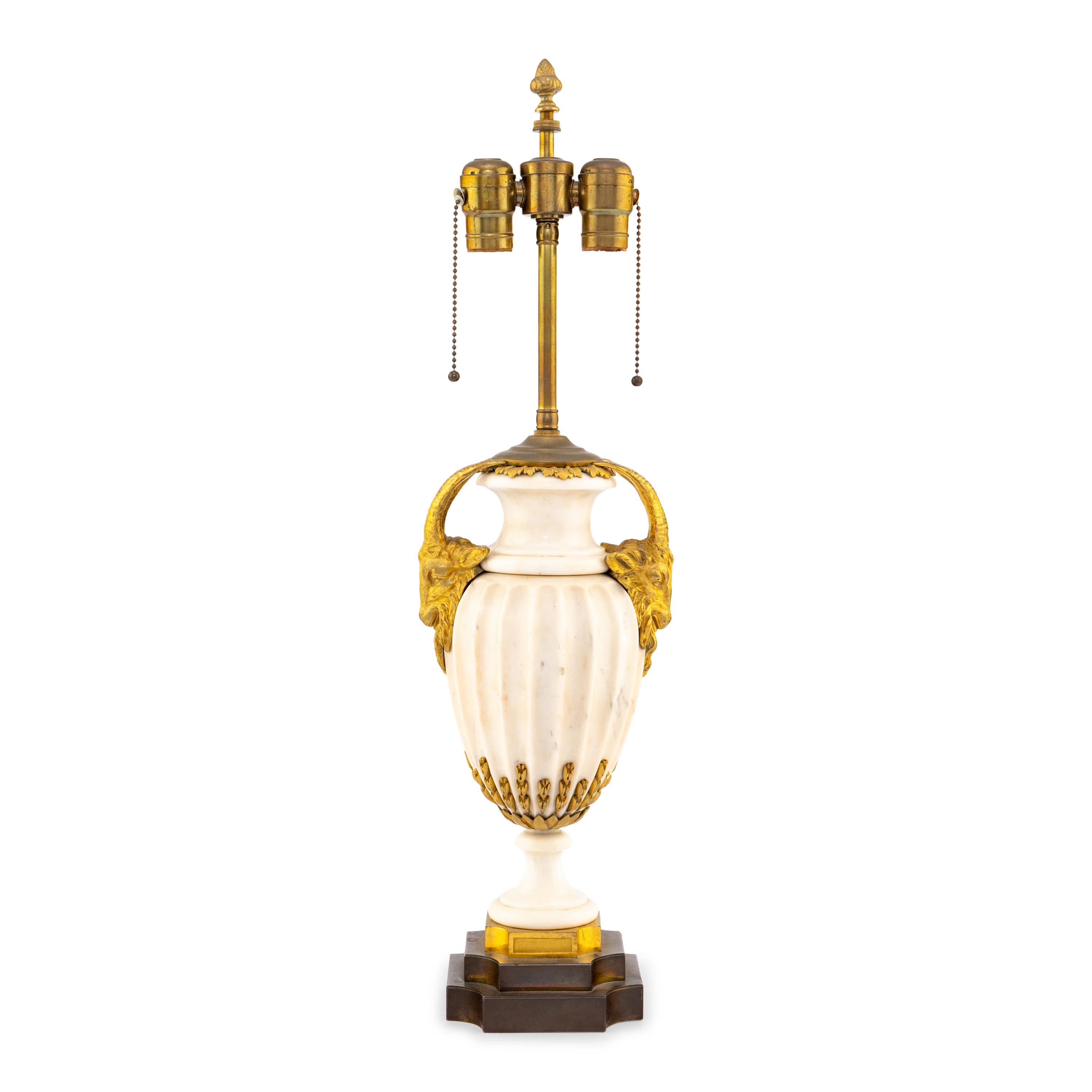 A French Neoclassical Style Gilt Bronze Mounted Marble Urn