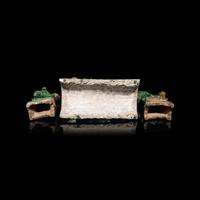 A Chinese Sancai Glazed ' Lion' Roof Tile and a Pair of Figures of Lions, Ming Dynasty 明 素三彩佛獅瓦當及佛獅像一對