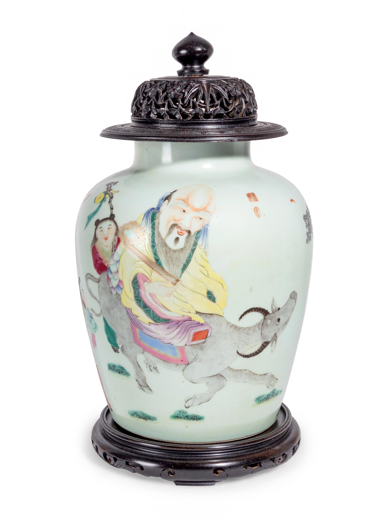 A Chinese Export Famille Rose Porcelain Jar and Carved Wood Cover