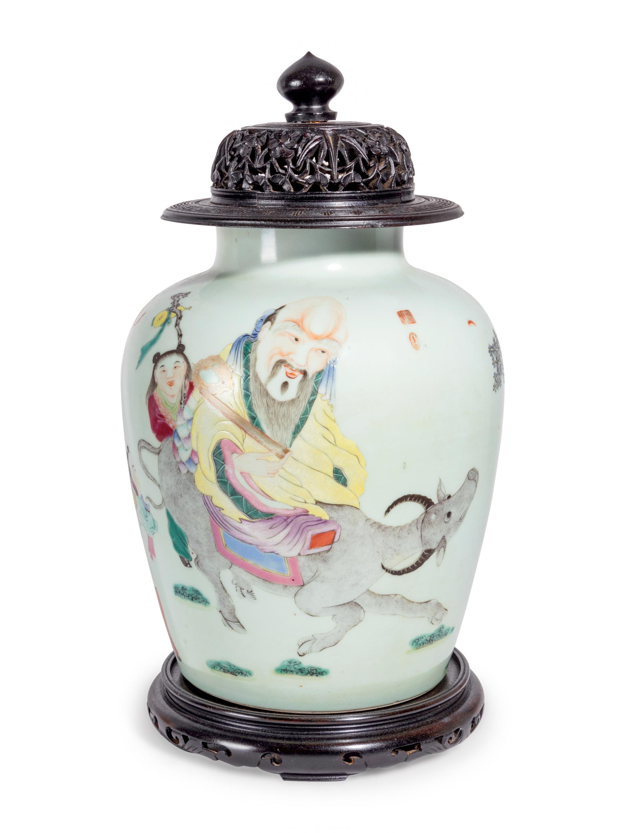 A Chinese Export Famille Rose Porcelain Jar and Carved Wood Cover