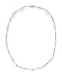 THREE NESTING CULTURED PEARL AND YELLOW GOLD STATION NECKLACES