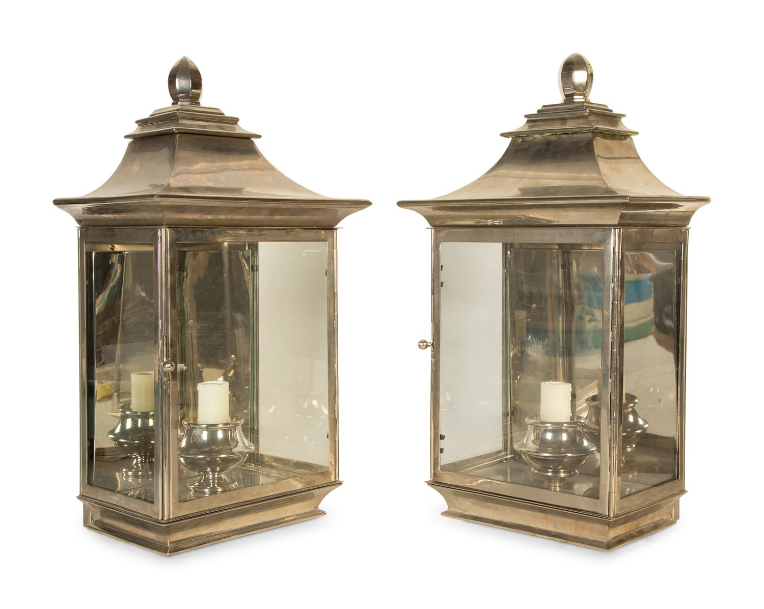A Pair of Polished Silvered Metal and Glass Wall Lanterns