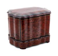 A Napoleon III Parcel Ebonized Amboyna Cave à Liqueur