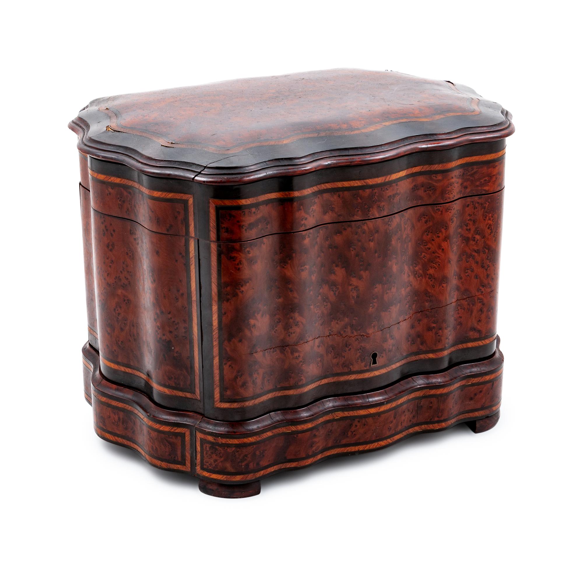 A Napoleon III Parcel Ebonized Amboyna Cave à Liqueur