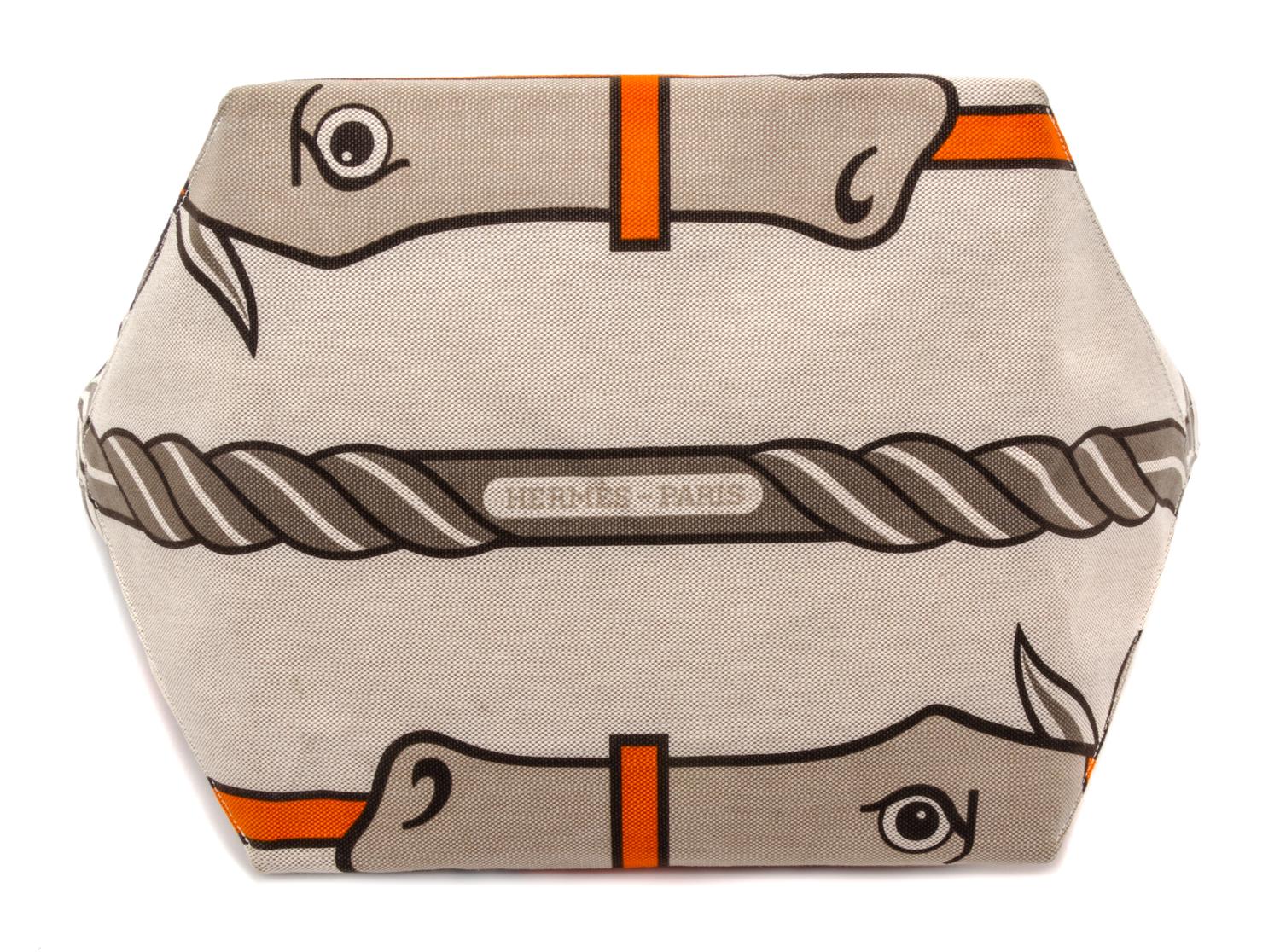 An Hermes Steeple Toile Tote Bag, 22" x 12" x 12".