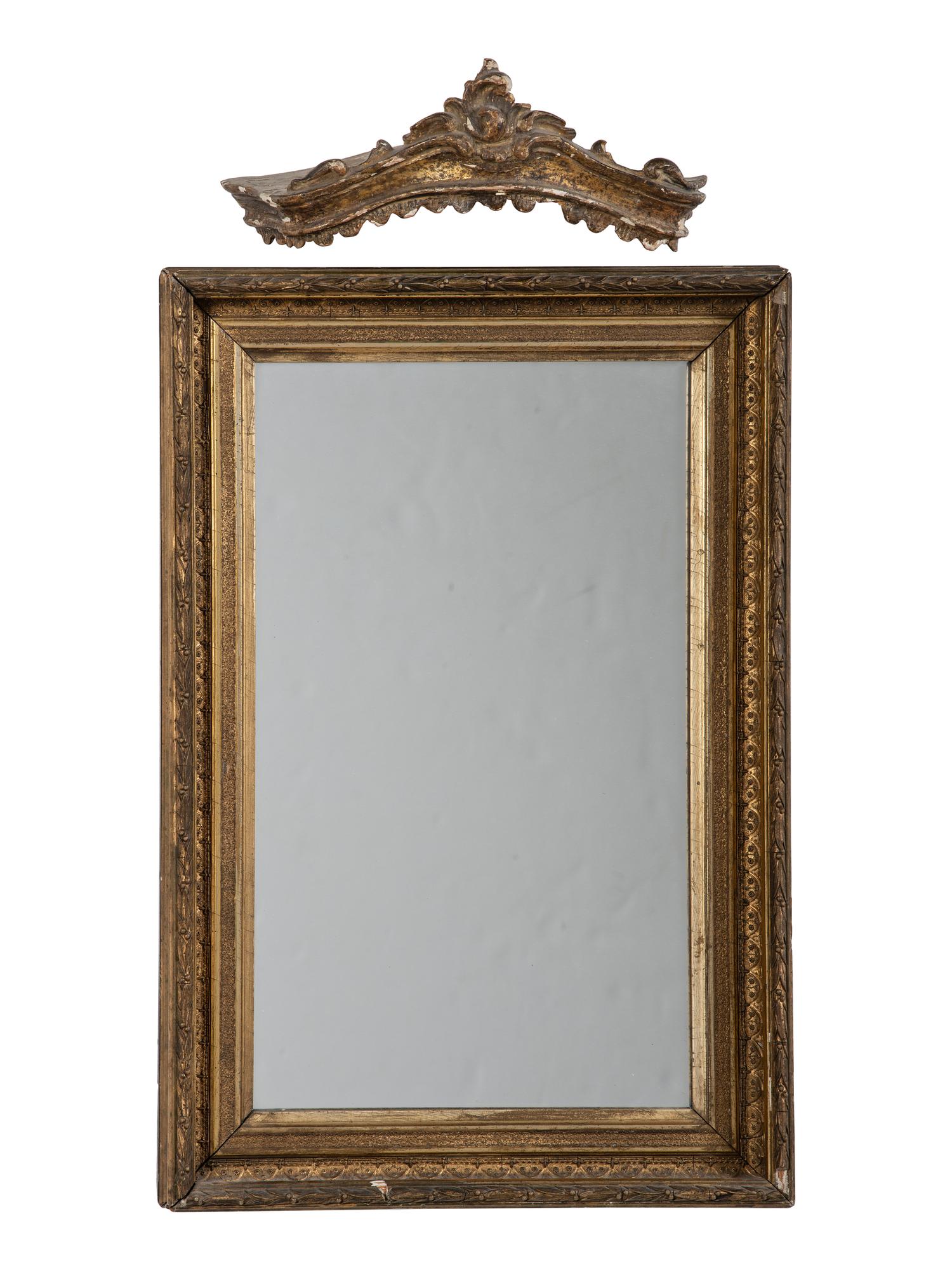 A Carved and Giltwood Mirror