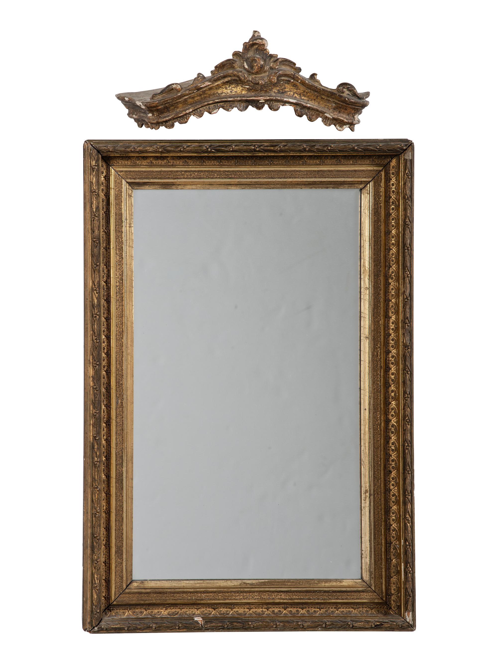 A Carved and Giltwood Mirror