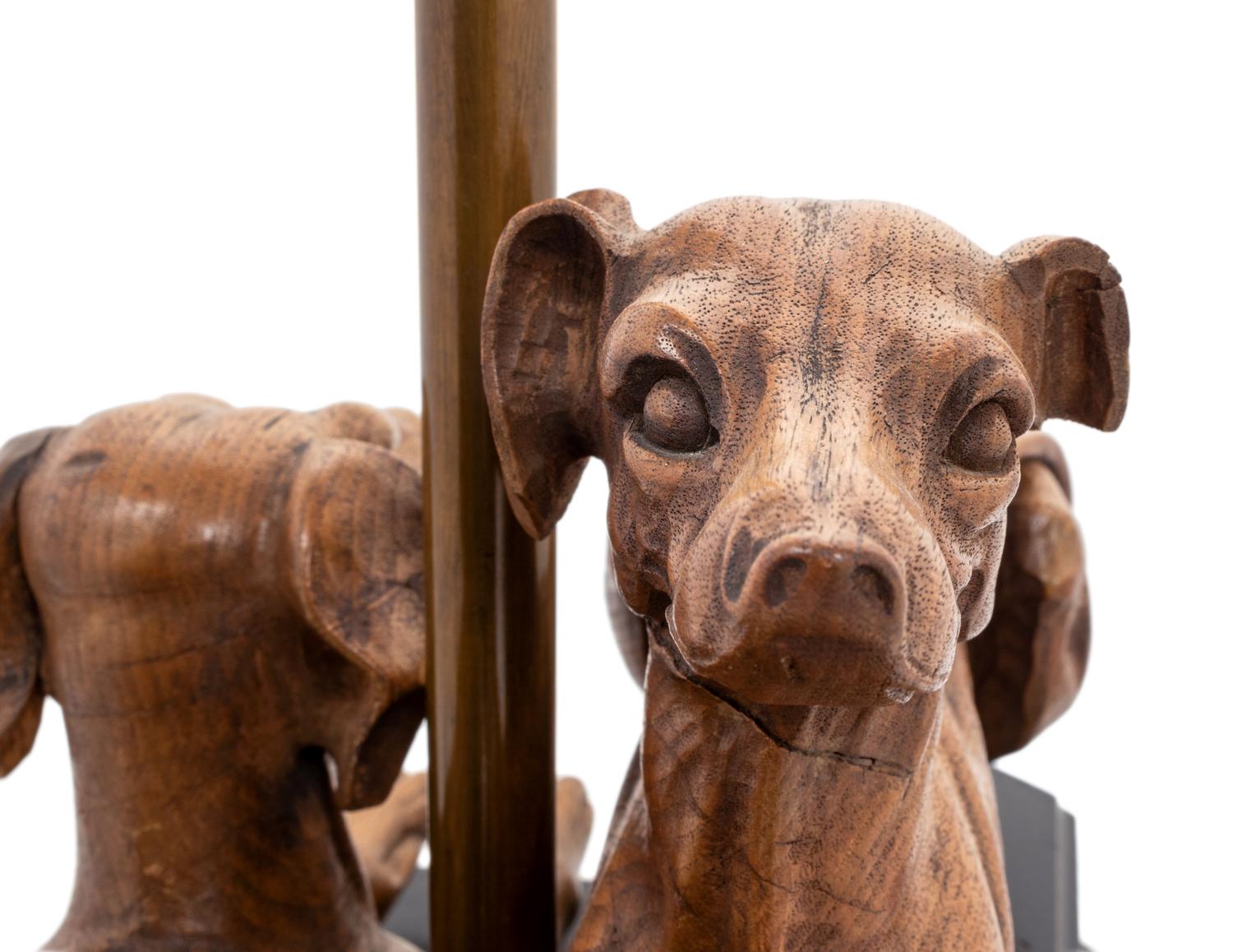 A Carved Wood Greyhound Group Mounted as a Table Lamp