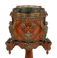 A Napoleon III Gilt Metal Mounted Kingwood Jardinière and Stand