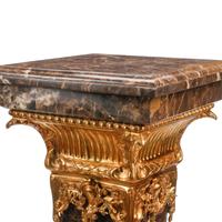 A Pair of Gilt Bronze Mounted Marble Pedestals