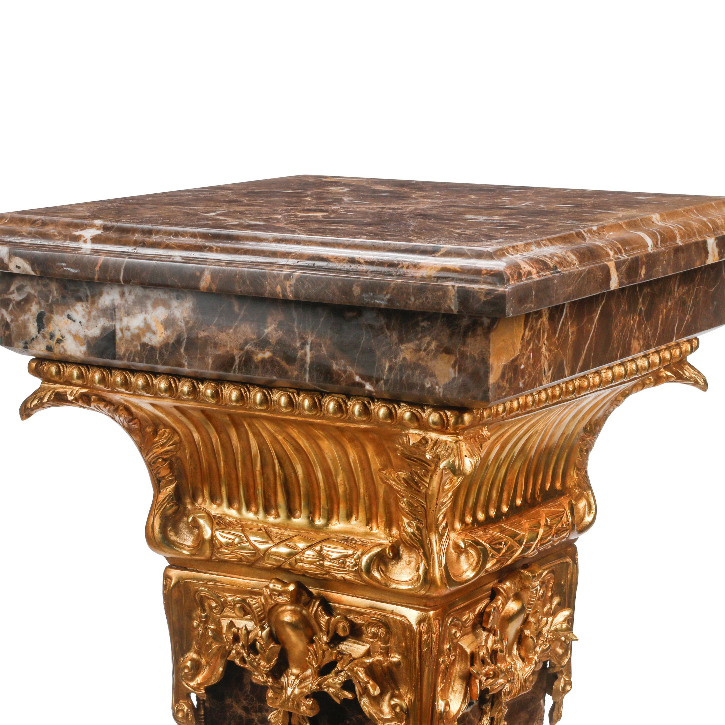 A Pair of Gilt Bronze Mounted Marble Pedestals