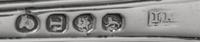 An Assembled Set of Twelve George III Silver Serving Spoons