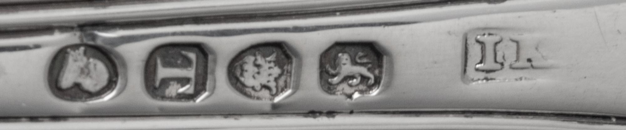 An Assembled Set of Twelve George III Silver Serving Spoons