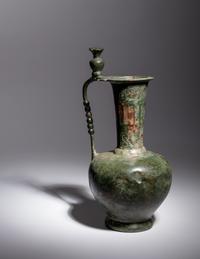 An Umayyad or Early Abbasid Bronze Ewer with a Pomegranate