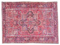 An Heriz Wool Rug — 20TH CENTURY