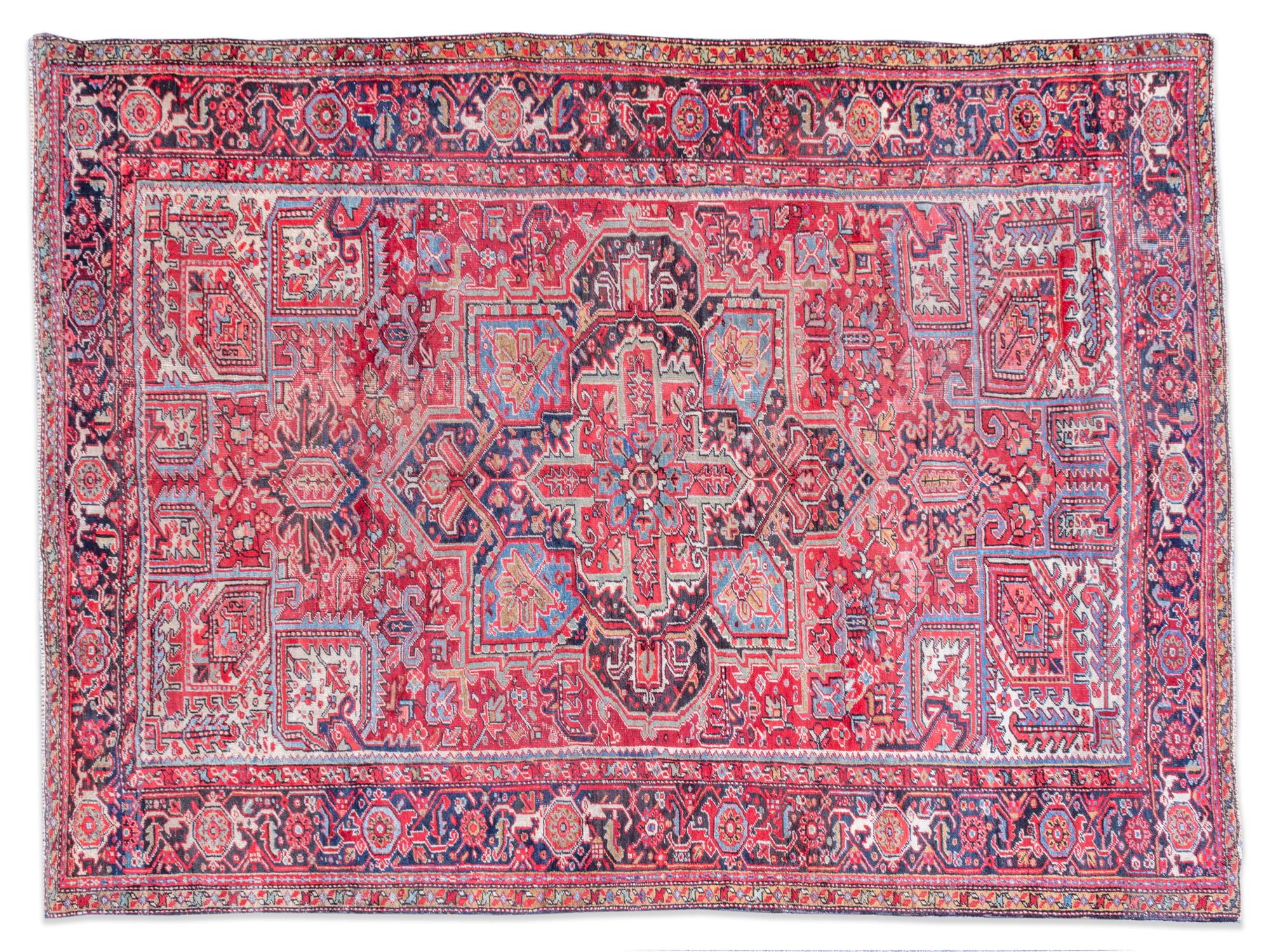 An Heriz Wool Rug — 20TH CENTURY