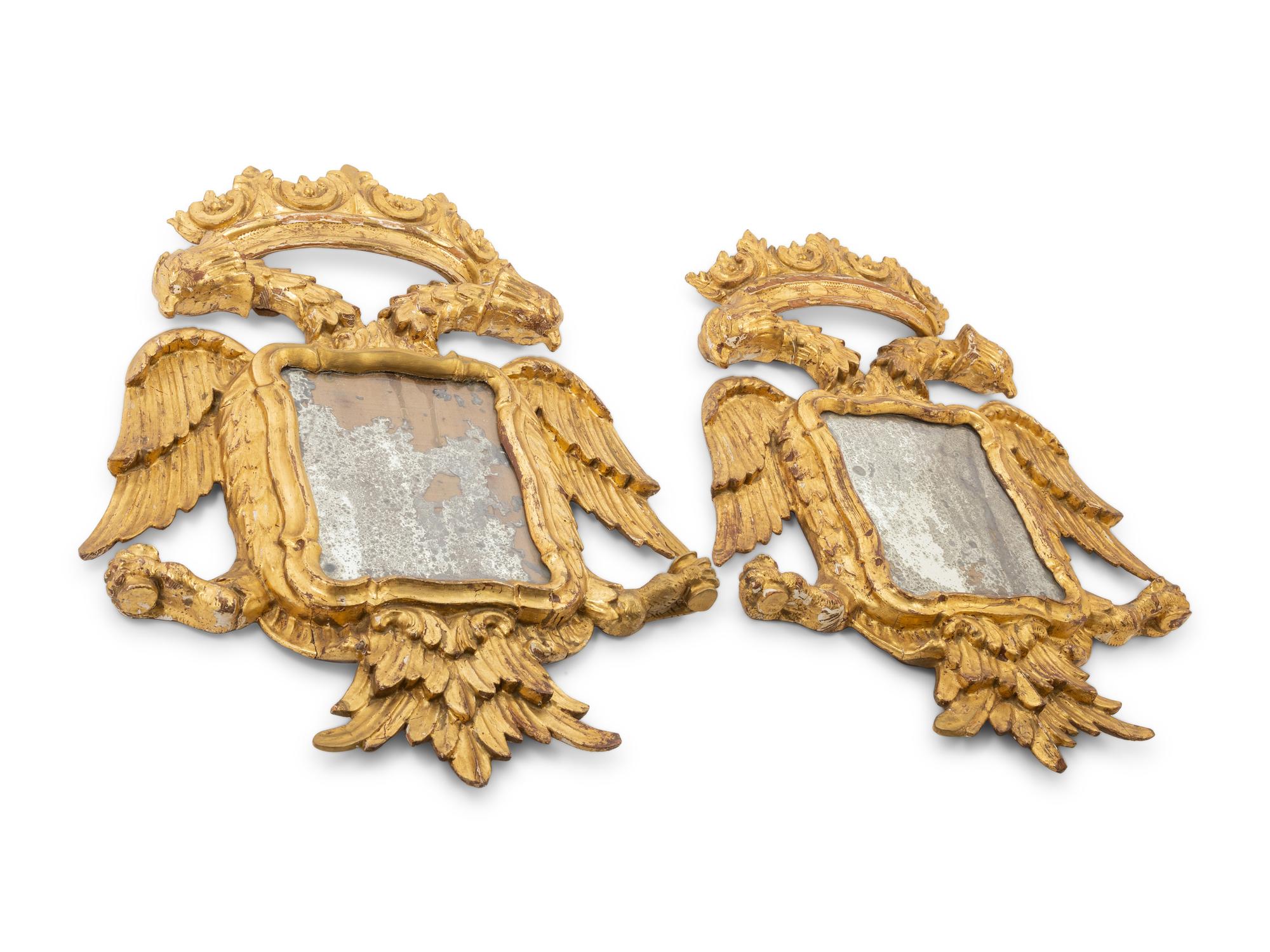 A Pair of Continental Giltwood Mirrors