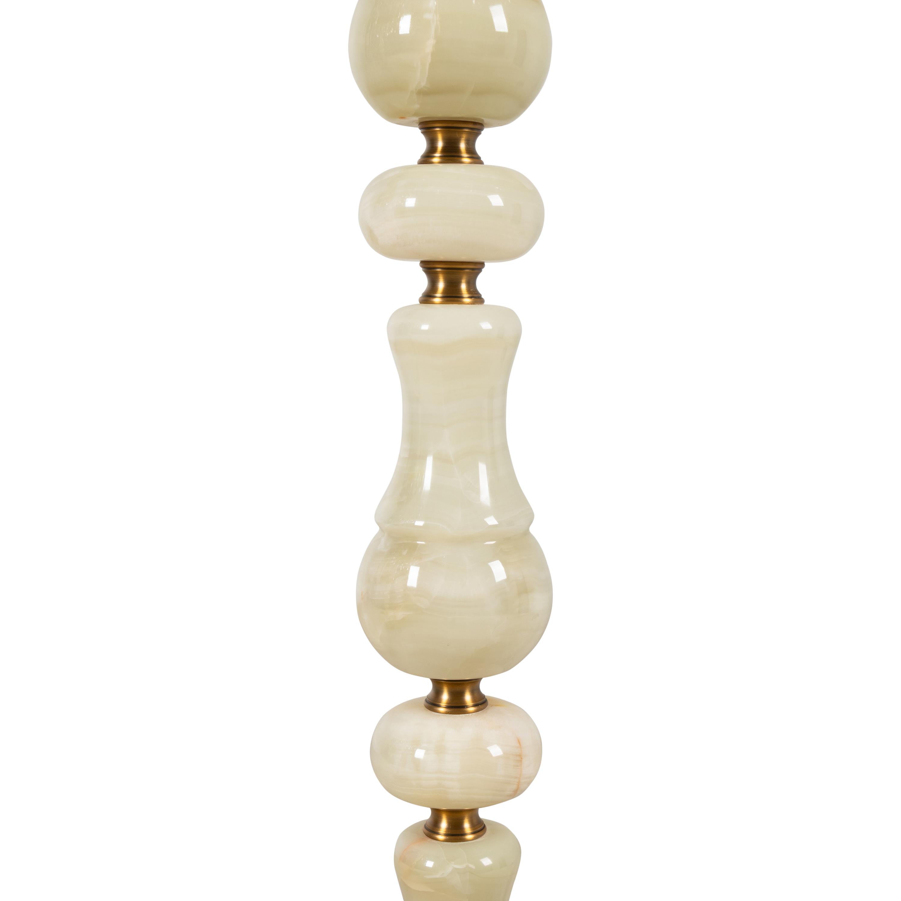 A Pair of Brass Mounted Onyx Nine-Light Torchères