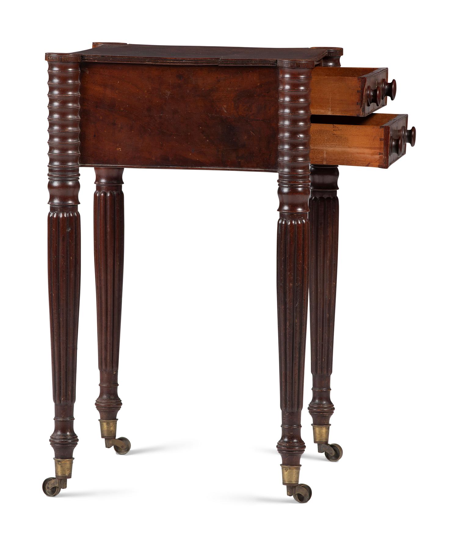 A Classical Carved and Figured Mahogany Two-Drawer Work Stand