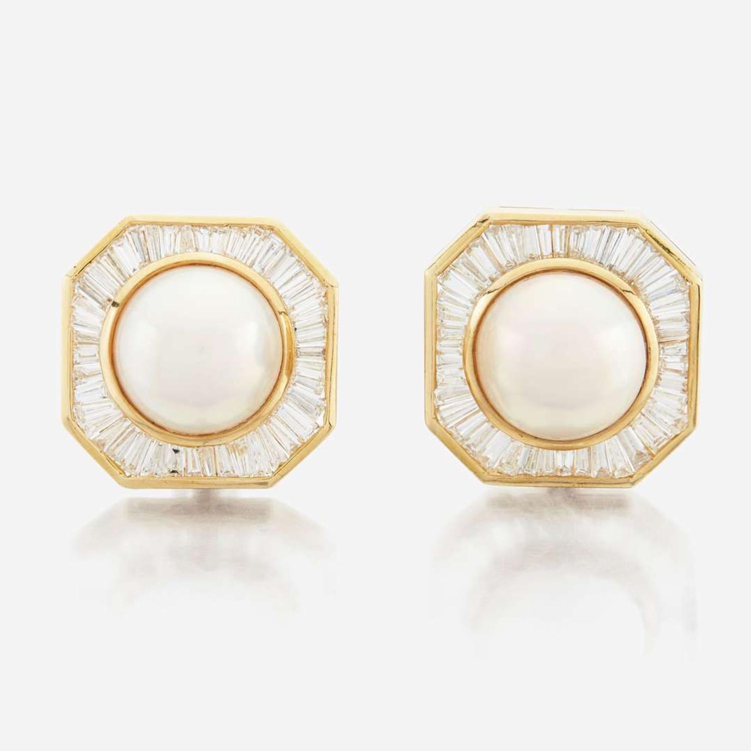 A pair of pearl, diamond and white gold earrings