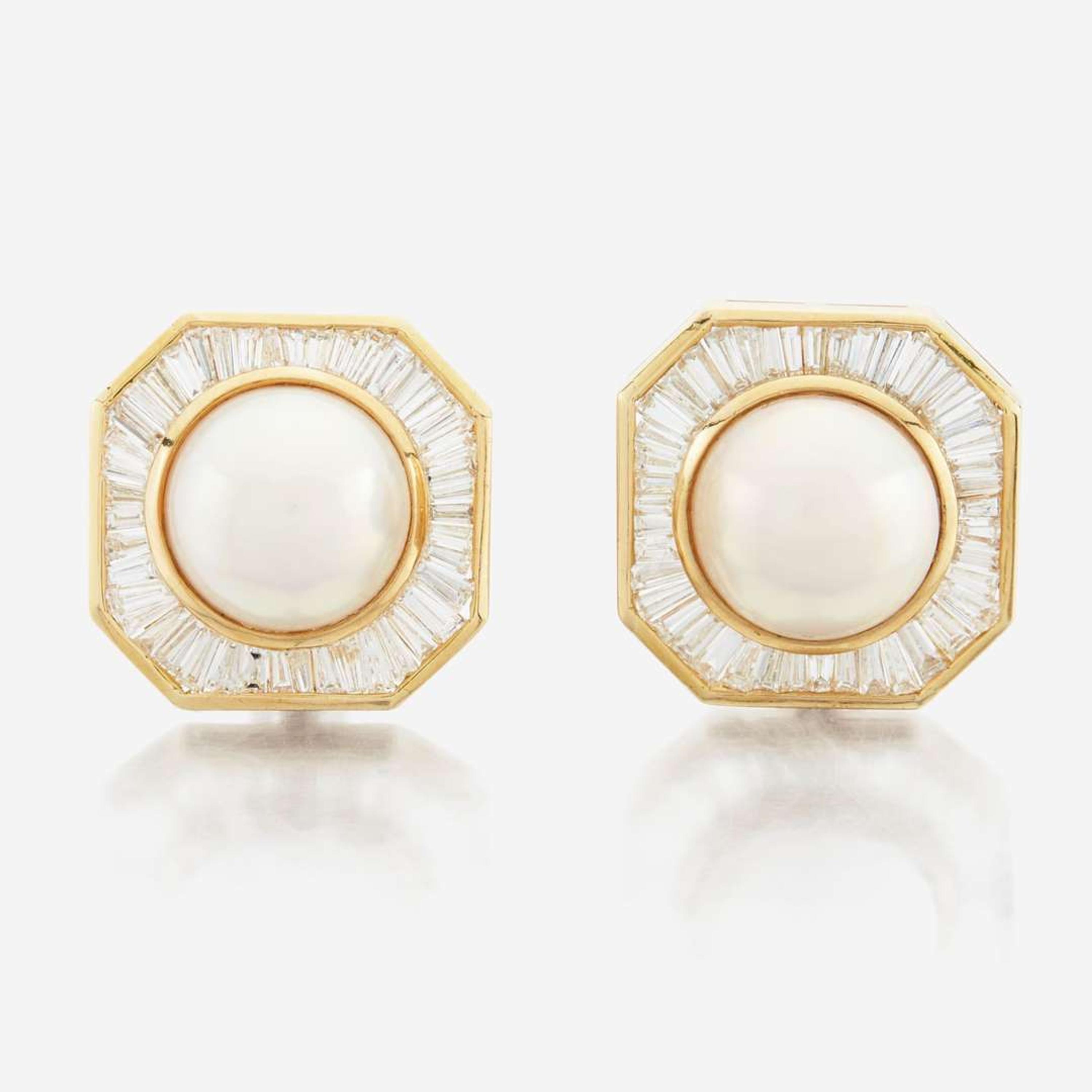 A pair of pearl, diamond and white gold earrings