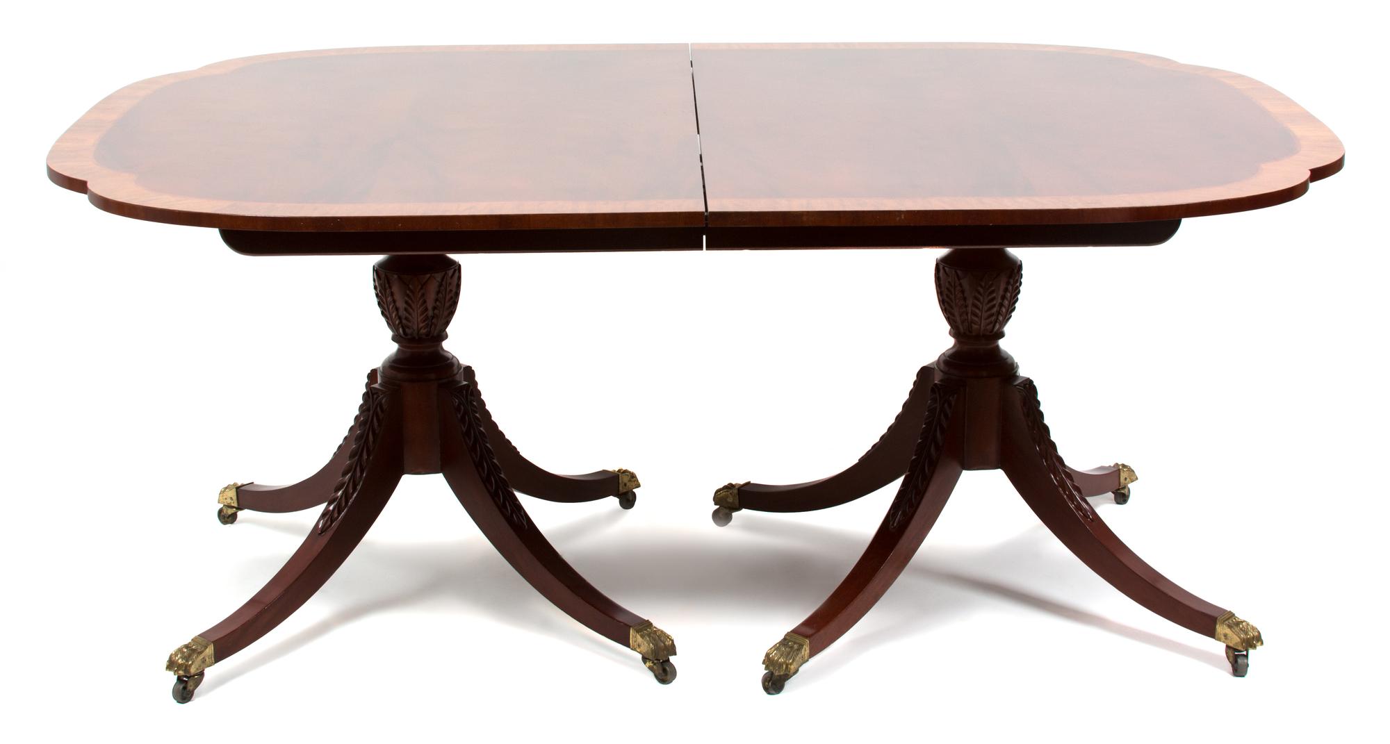 A George III Style Inlaid Mahogany Pedestal Dining Table Height 29 x length closed 69 x width 46 inches. — 20TH CENTURY