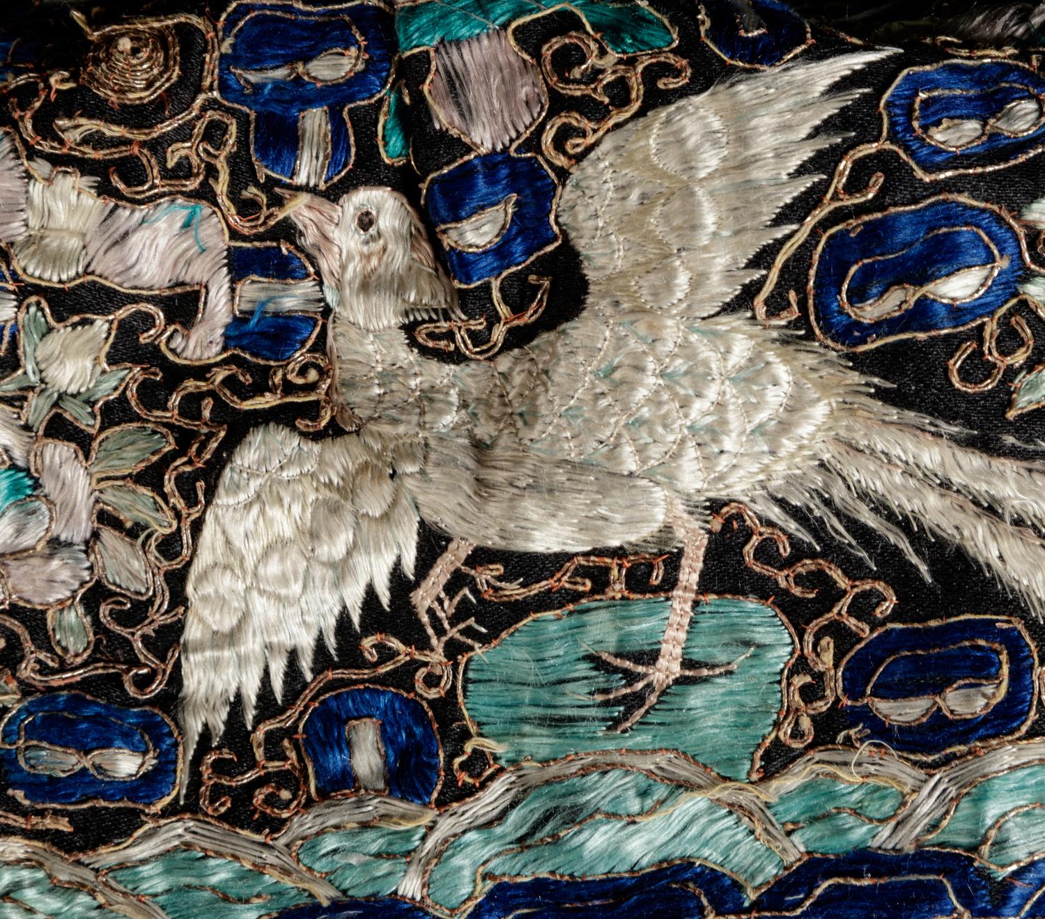 A Chinese Embroidered Silk Purse with a Pair of Jade Bangles