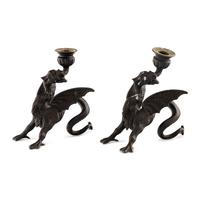 A Pair of Cast Metal Griffin Candlesticks