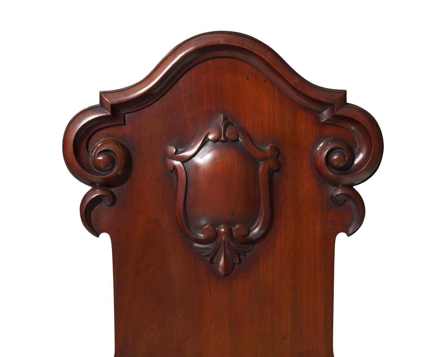 A pair of Victorian mahogany hall chairs, circa 1850