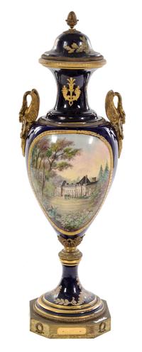 A Large Gilt Bronze Mounted Sevres Porcelain Urn and Cover Height overall 50 inches. — 19TH CENTURY