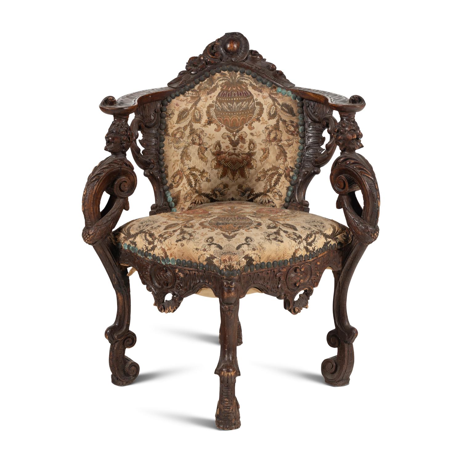 An Italian Carved Walnut Corner Chair