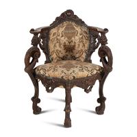 An Italian Carved Walnut Corner Chair