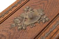 A Black Forest Gilt Metal Mounted Oak Box