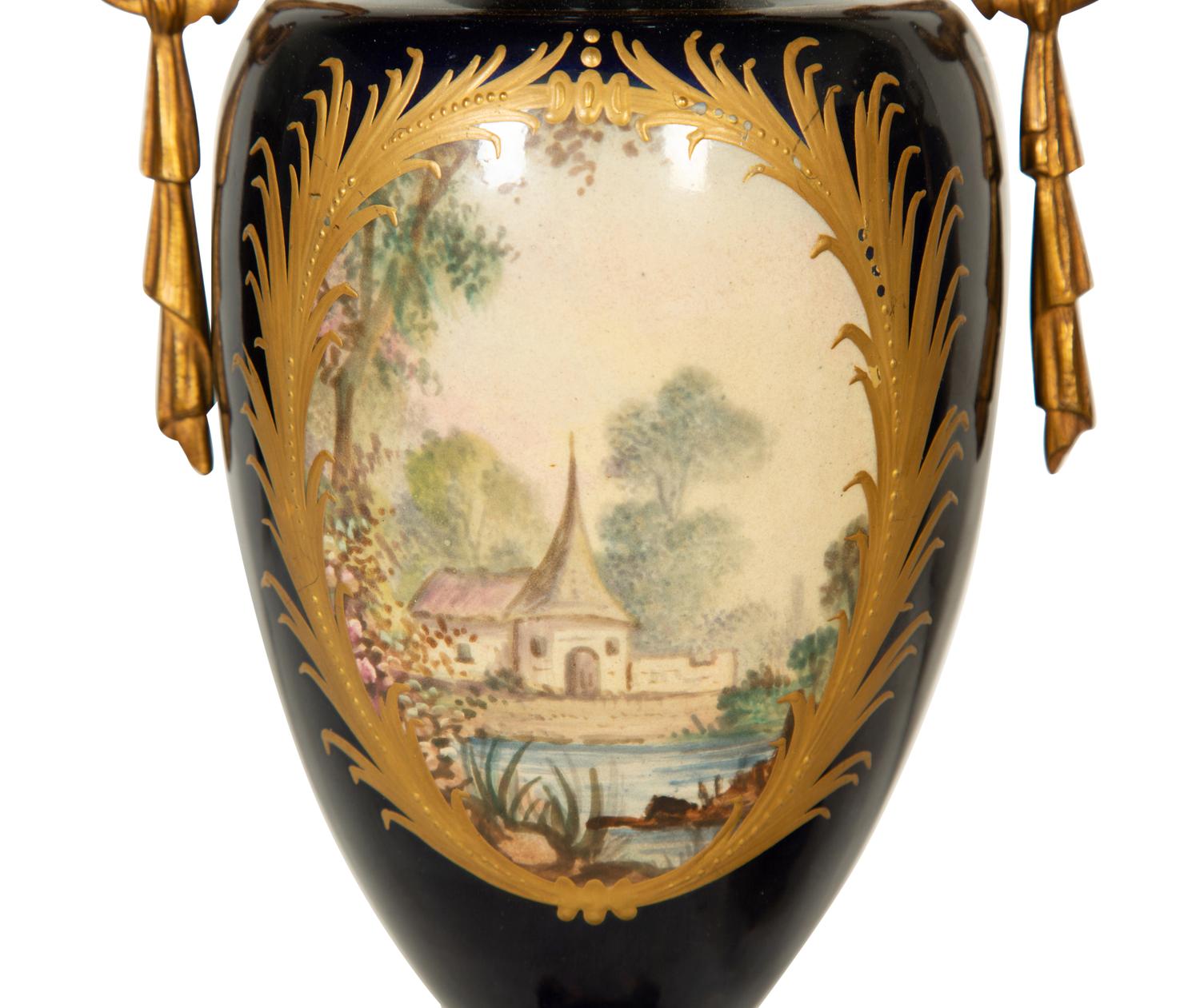 A Pair Gilt Metal Mounted Sèvres Style Porcelain Urns