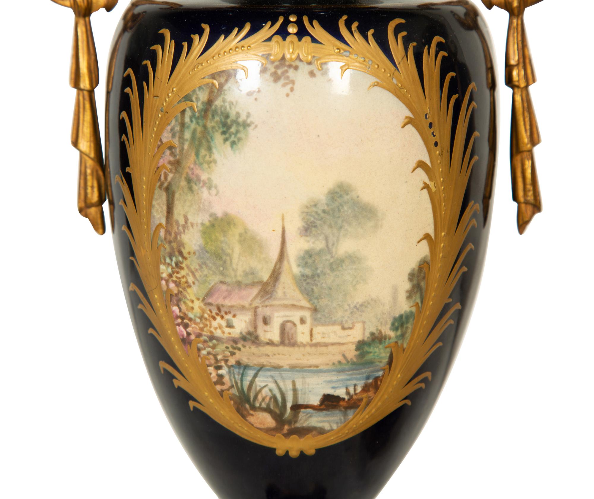 A Pair Gilt Metal Mounted Sèvres Style Porcelain Urns